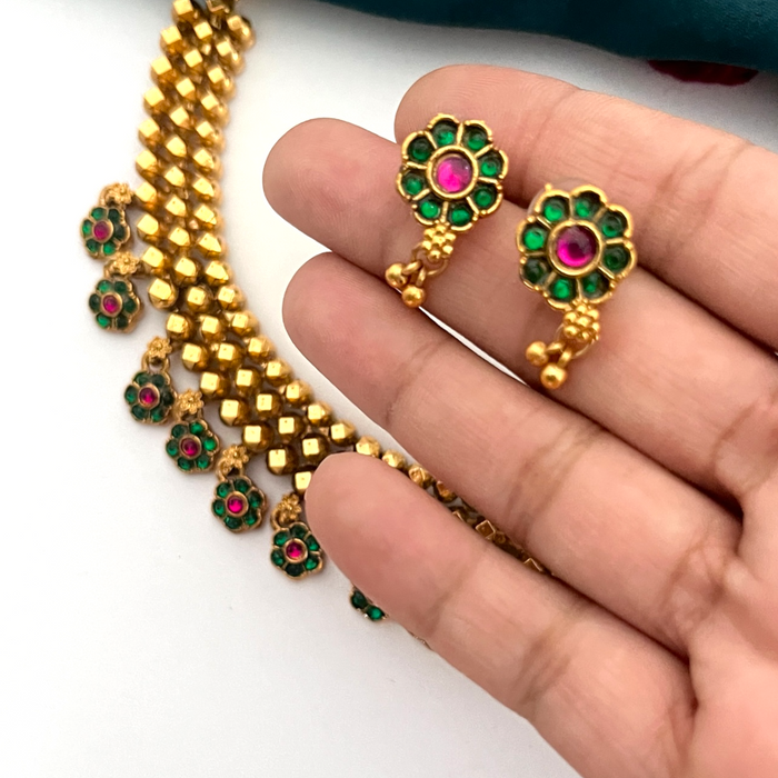 Golden Beads Necklace set with Green Floral Drops