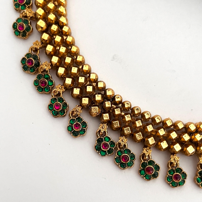 Golden Beads Necklace set with Green Floral Drops
